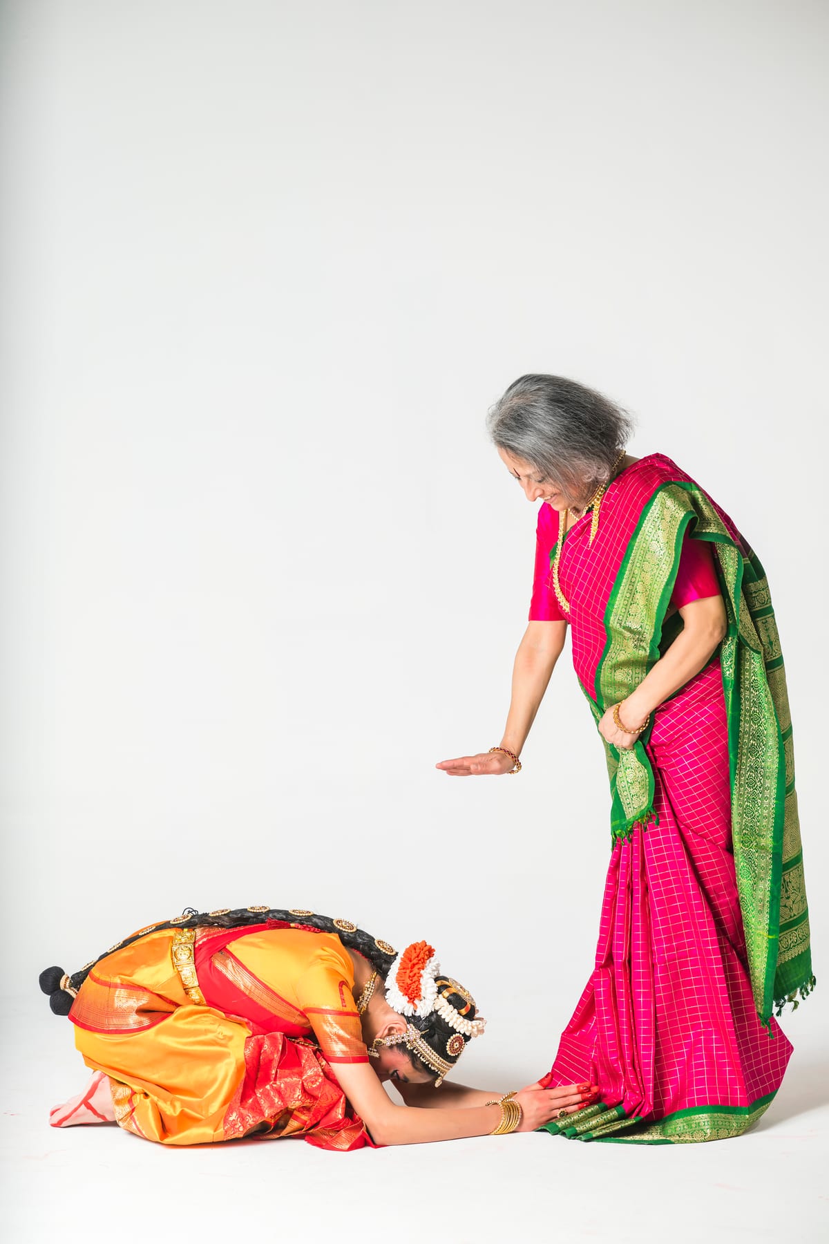 Aditi bowing to her Guru